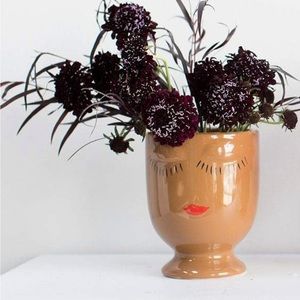 Fun Decorative pot. Carmel face.